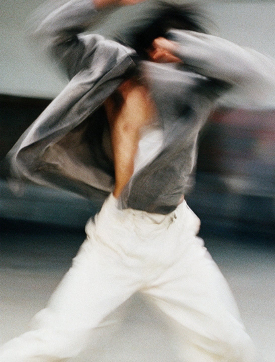 Motion-blurred figure backstage