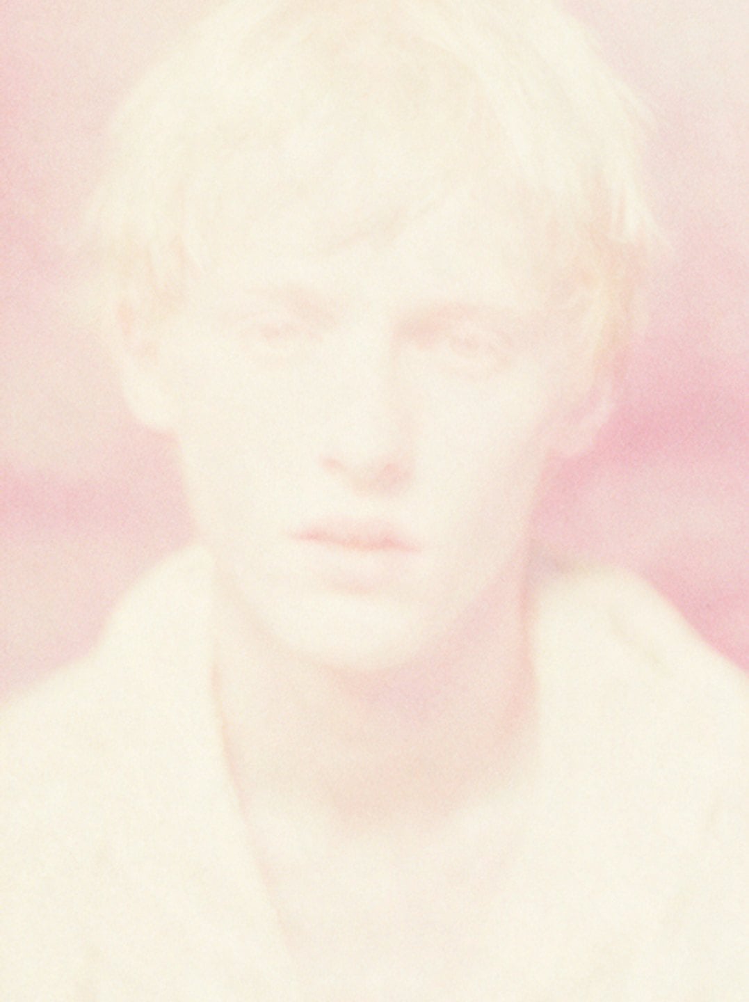 Overexposed pink-washed portrait