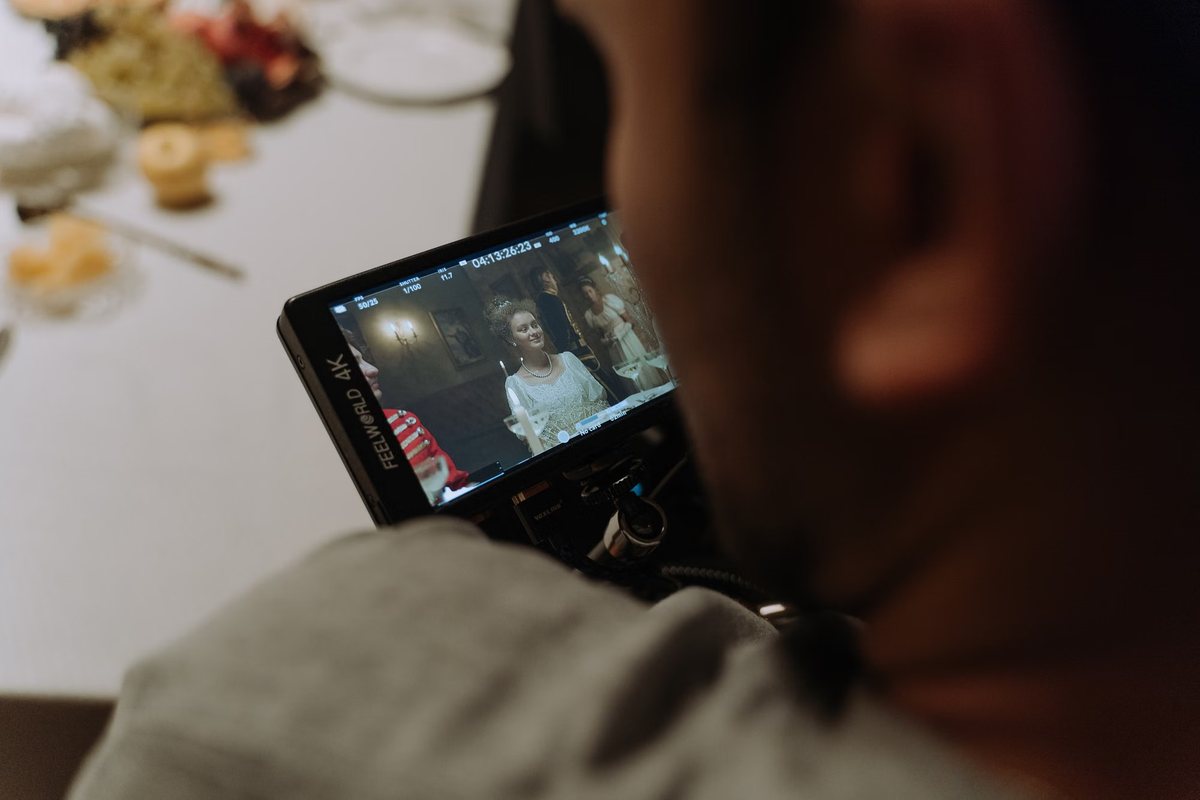 Director reviewing a take on a field monitor