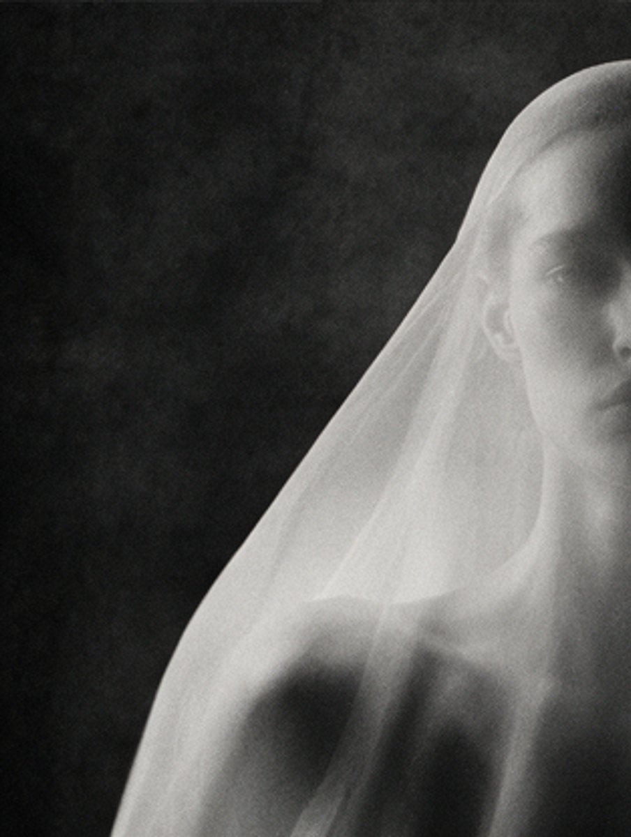 Portrait behind a translucent veil, monochrome