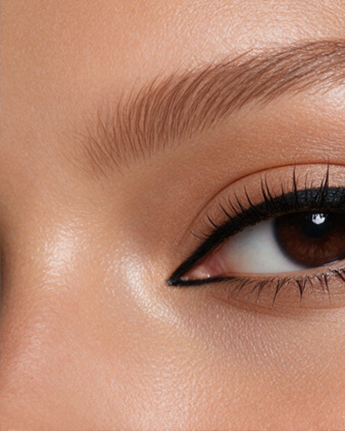 Close-up of an eye with drawn black liner
