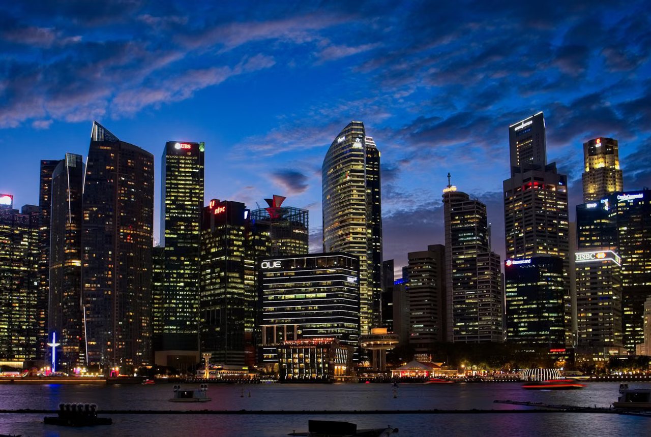 City skyline lit up at blue hour