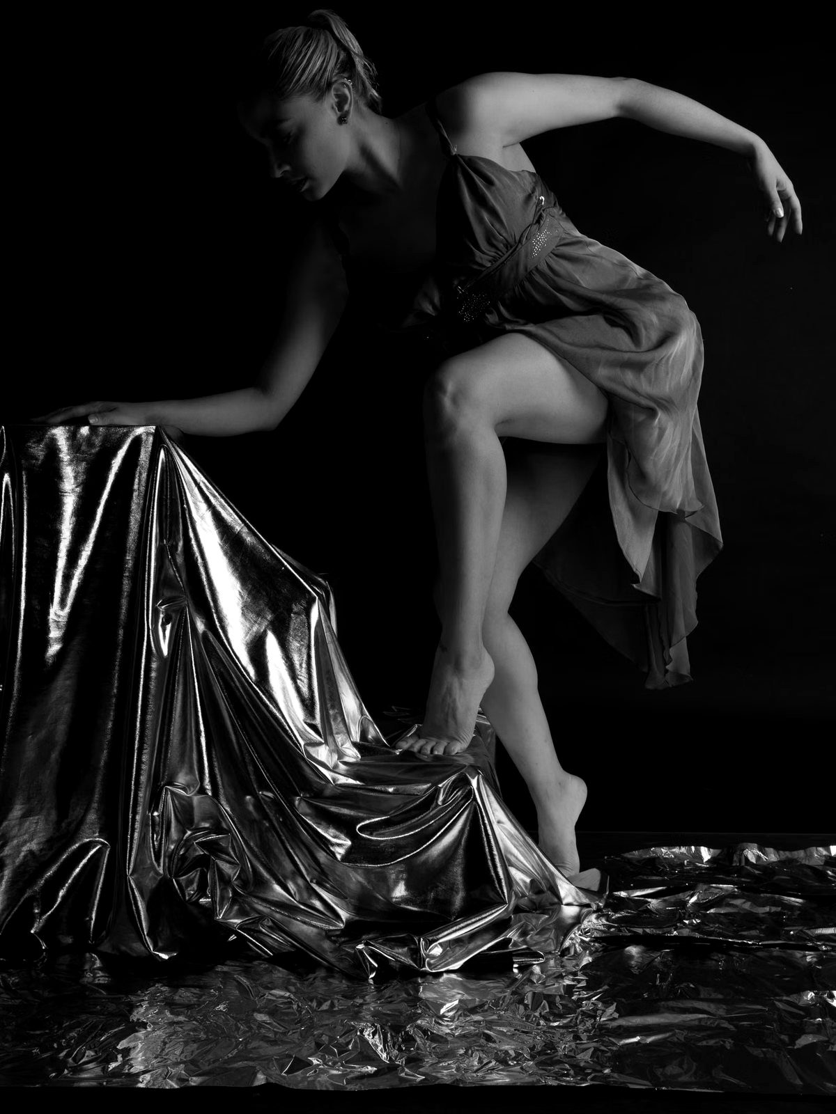 Extended leg over draped foil