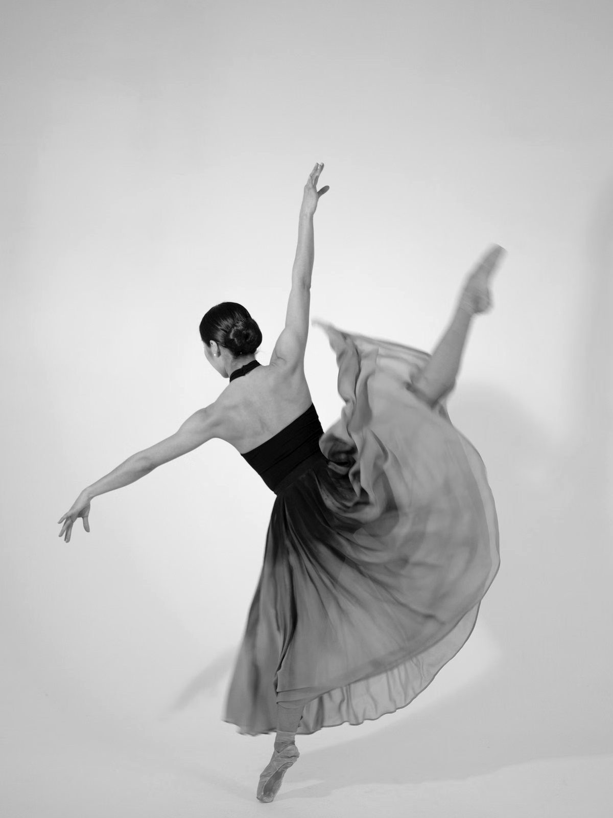 Split leap with a trailing skirt