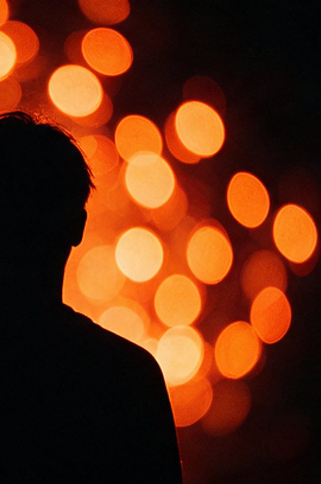 Amber bokeh dissolving out of focus