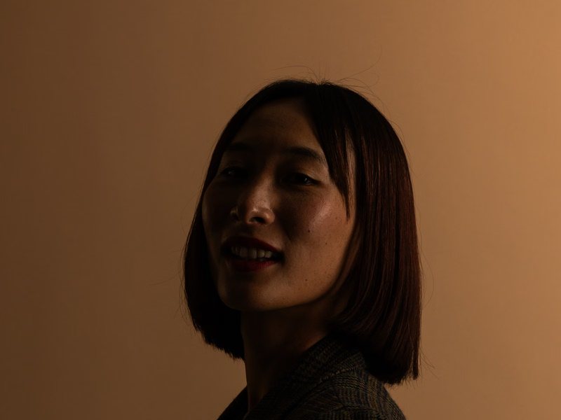 Profile lit by warm backlight