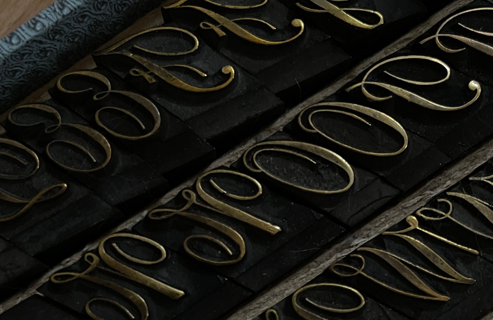 Brass script letterpress type from the Nullspace studio archive