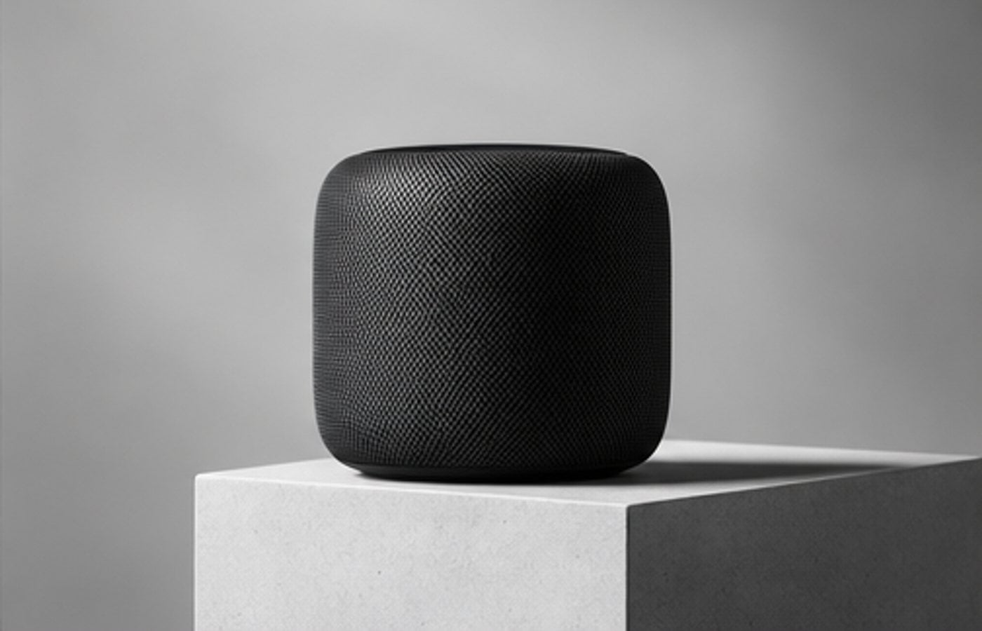 Fabric smart speaker on a stone plinth