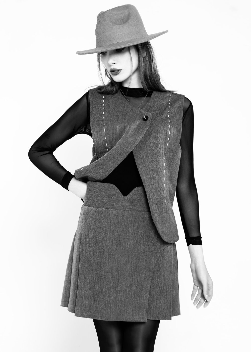Model in a felt hat and flannel wool dress