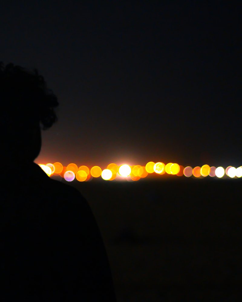 Figure against the last light on the horizon