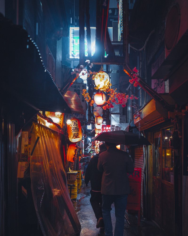 Lantern-lit backstreet in the rain