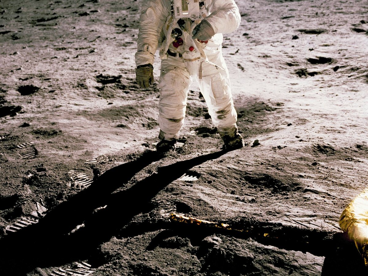 Apollo astronaut standing on the lunar surface