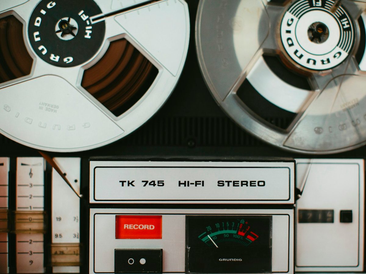 Close-up of a vintage reel-to-reel tape machine